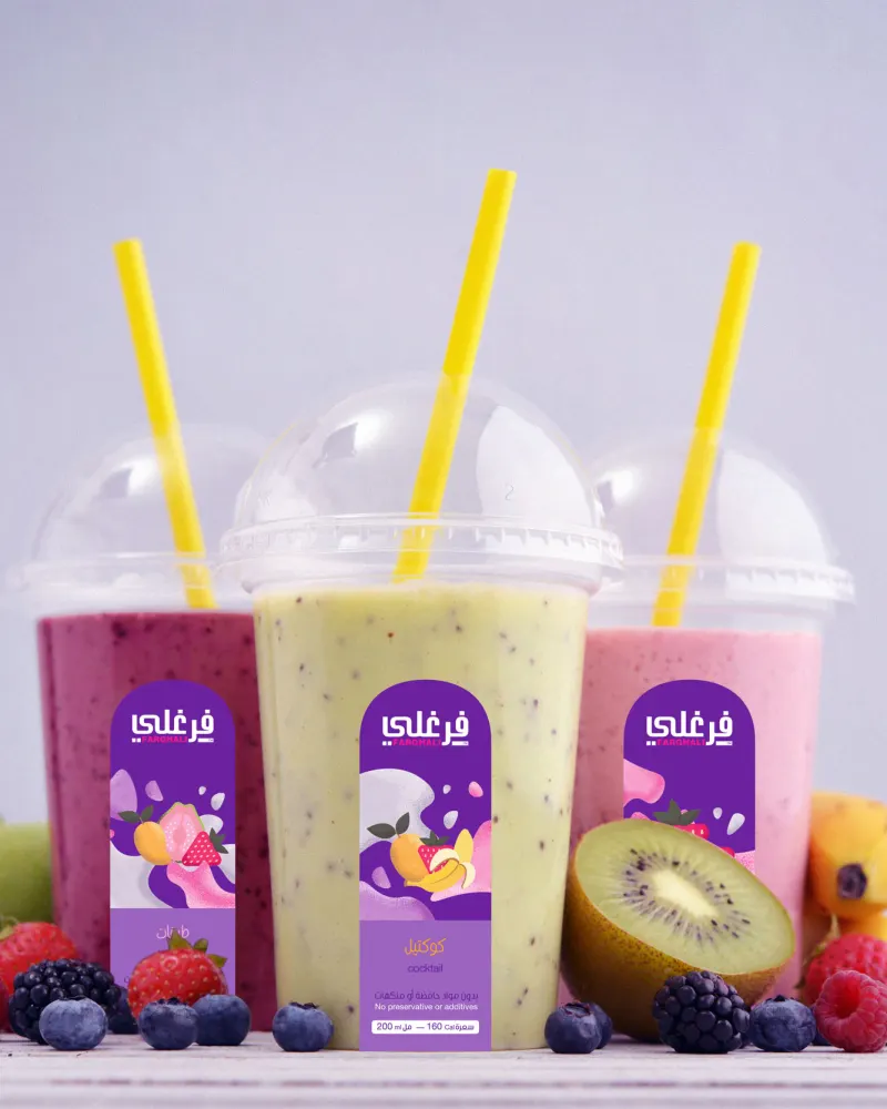 Farghali smoothies in branded cups with berries, kiwi and apples
